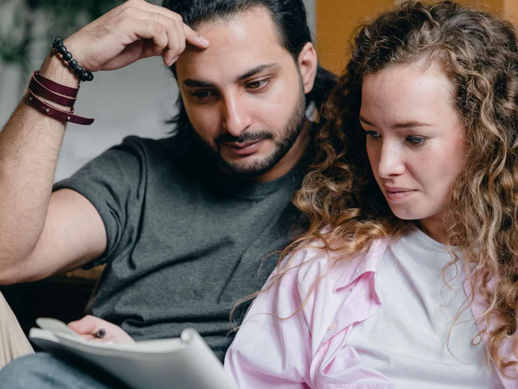 Man and woman searching for personal injury attorney in Philadelphia